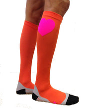 mandarin orange and neon pink compression socks