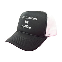 black sponsored by coffee trucker hat